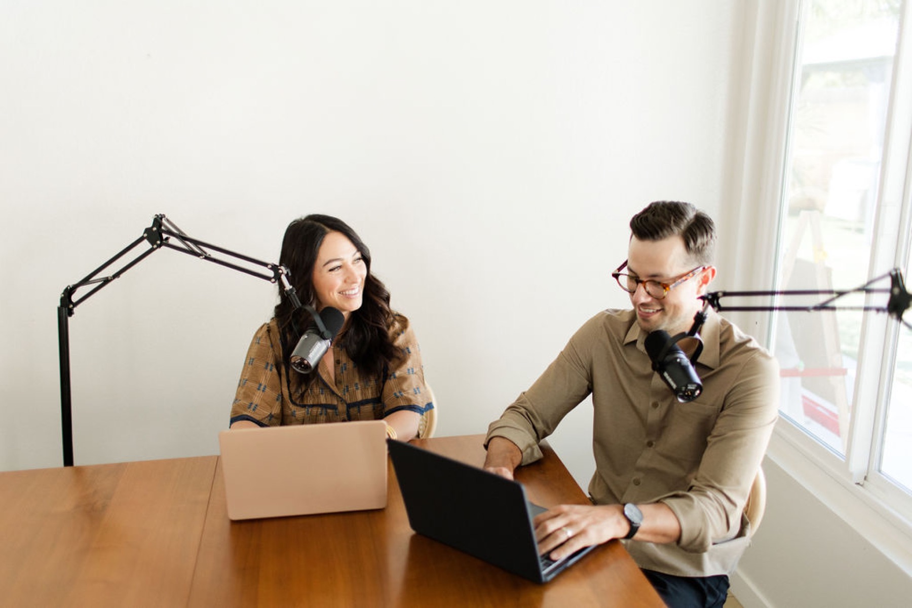Dr. Danielle Roach and Kyle Roach recording The Expanded Life Podcast